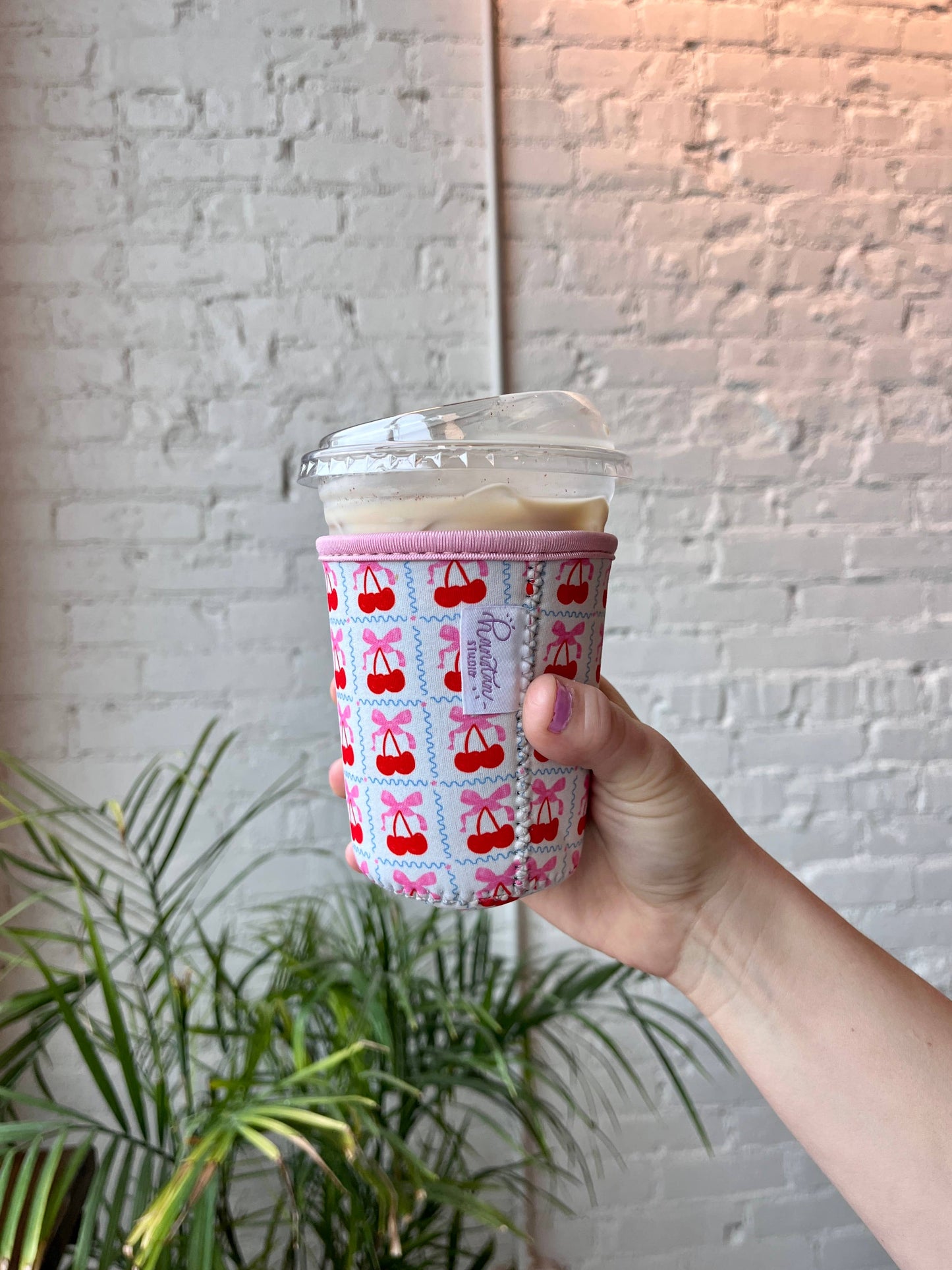 Bow Cherry Coffee Sleeve